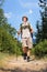 Young hiker hiking in the mountain