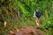 Young hiker on Kalalau trail in Kauai