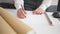 Young hispanic man architect drawing house plans at office