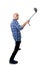 Young Hispanic man in casual shirt having fun shooting mobile phone selfie picture holding stick