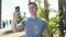 Young hispanic man smiling confident having video call at seaside