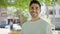 Young hispanic man smiling confident standing at park