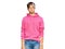 Young hispanic man wearing casual pink sweatshirt puffing cheeks with funny face