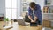 Young hispanic man working heart out as dedicated business worker at his chic office desk, sinking into serious concentration