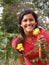 Young Hispanic Teen Girl with Yellow Roses