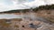 Young Hopeful Geyser next to Firehole Lake in the Lower Geyser Basin in Yellowstone National Park in Wyoming USA