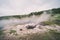 Young Hopeful Geyser in Yellowstone National Park steams and bubbles