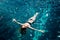 Young hot woman resting alone. Picture of calm relaxed girl in water swimming. Looking up in sky and taking sunbathing