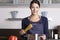 Young housewife preparing a healthy Italian pasta