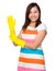 Young housewife wear with plastic glove