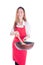 Young housewife wearing red apron and holding pan