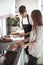 Young husband and wife cook Breakfast together