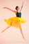 Young and incredibly beautiful ballerina is dancing at studio