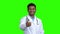 Young Indian doctor showing thumb up.