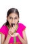 Young indian girl eating a gulab jamun - an indian sweet