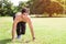 Young Indian muscular man running in ground , Male fitness concept.