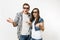 Young irritated dissatisfied couple, woman and man in 3d glasses and casual clothes watching movie film on date and