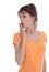 Young isolated woman on white surprised in an orange shirt.