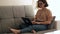 Young Italian Woman Working from Home on a Laptop