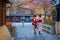 Young Japanese woman in traditional Kimono dress at Tatsumi bashi bridge in Gion district, Kyoto, Japan