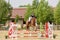 Young Jockey on horse at regional competition  jumping over obstacle