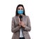 Young journalist with microphone wearing medical mask on background. Virus protection