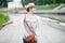 Young joyful happy traveler woman in straw hat enjoying her trip