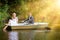 Young just married bride and groom on boat