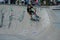 Young kickbiker on the ramp in a Skatepark Espoo, Finland