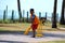 Young Kid Playing Cricket at Street