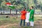 Young kids and boy of different age and different religion hearing tricolor dress and holding Indian National flag.