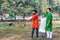 Young kids and boy of different age and different religion hearing tricolor dress and holding Indian National flag.