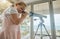 Young kids, telescope and home learning about planets, stars and sky in space. Excited, curious and happy girl play