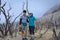 A young korean couple are doing outdoor activities on mountain. Papandayan Mountain is one of the favorite place to hike on Garut