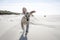 Young labrador running on the beach