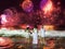 Young ladies looking the New Year`s Eve fireworks in Rio de Janeiro, Brazil