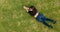 Young lady laying in the grass