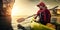 Young lady paddling kayak