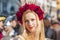 Young lady with red roses during Venetian carnival