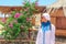 Young Lady Standing by the Cottage in a Camp in Sinai