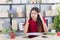 Young lady working at home office