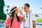 Young latin tourist couple smiling happy at street of city