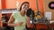 Young latin woman musician smiling confident singing song dancing at music studio