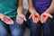 Young lesbians holding letters LGBT, closeup