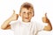 Young little boy isolated thumbs up on white