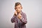 Young little caucasian kid with blue eyes wearing elegant shirt standing over isolated background Ready to fight with fist defense