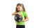 Young little girl in green shirt with soccer ball in hands