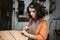 Young Luthier Working In Her Workshop