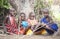 Young maasai boys resting under a tree