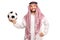 Young male Arab holding a football
